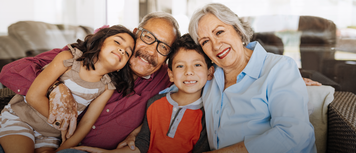 nimble_asset_EN_stock-photo-grandparents-and-their-young-grandchildren-at-home-portrait-401699044