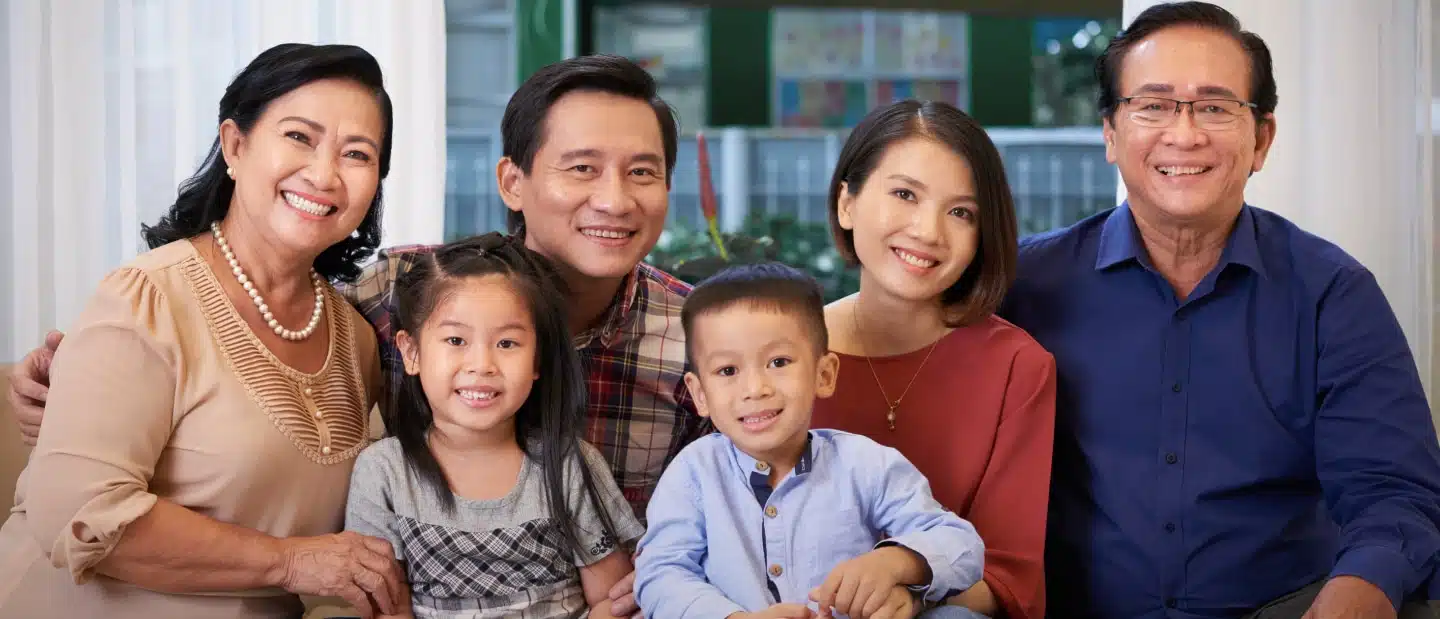 nimble_asset_EN_stock-photo-grandparents-and-their-young-grandchildren-at-home-portrait-401699044